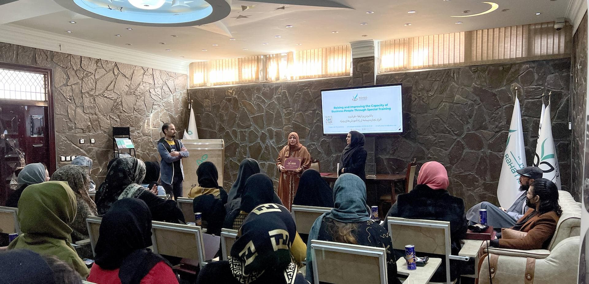 Boy carrying bushes to sell it and feed his family